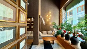 Posezení v ubytování Cosy Rooms Tapinería