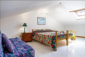 En eller flere senge i et værelse på On the notes of the sea