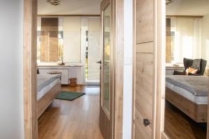 Ένα ή περισσότερα κρεβάτια σε δωμάτιο στο Appartement Auszeit -408-
