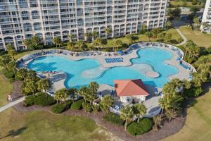 an aerial view of a pool at a resort at Yacht Club Villas 1-505 - Marina View in Myrtle Beach