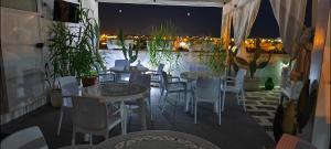 Reštaurácia alebo iné gastronomické zariadenie v ubytovaní Silvia Casa Vacanze