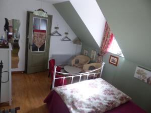 Postel nebo postele na pokoji v ubytování Moulin de la Beraudaie