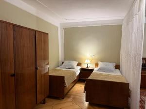 Postel nebo postele na pokoji v ubytování Guest House T&N