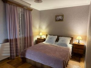 Postel nebo postele na pokoji v ubytování Guest House T&N