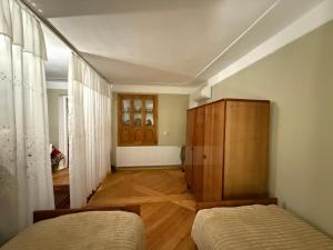 Postel nebo postele na pokoji v ubytování Guest House T&N
