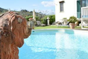 The swimming pool at or close to Villa Il Sasso - Dimora d'Epoca
