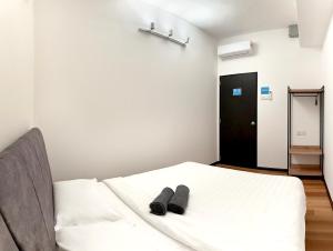 Letto o letti in una camera di Sofu Inn
