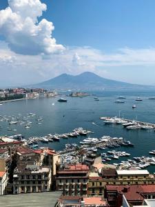 a view of a harbor with boats in the water at Suite Malu in Naples +19 photos