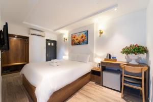 Postel nebo postele na pokoji v ubytování Thuan Phat Hostel