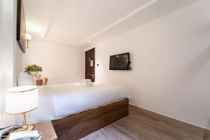 TV a/nebo společenská místnost v ubytování Thuan Phat Hostel