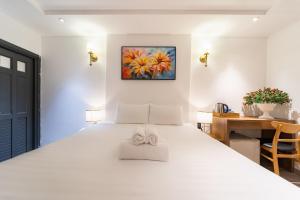 Postel nebo postele na pokoji v ubytování Thuan Phat Hostel