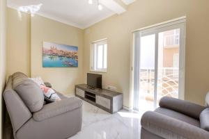 TV a/nebo společenská místnost v ubytování Seaview,beautiful 3br Apt 2
