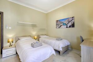 Posteľ alebo postele v izbe v ubytovaní Seaview, Beautiful 3br Apt 1