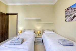 Posteľ alebo postele v izbe v ubytovaní Seaview, Beautiful 3br Apt 1