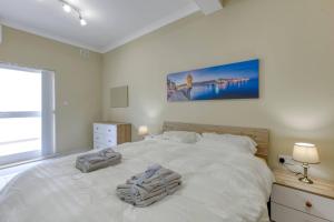 Posteľ alebo postele v izbe v ubytovaní Seaview, Beautiful 3br Apt 1