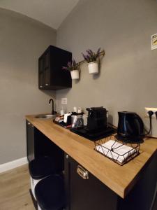 Cucina o angolo cottura di Manno Rooms Affittacamere