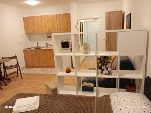 Kuchyň nebo kuchyňský kout v ubytování Apartman Vuk