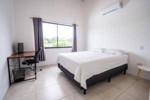 Ένα ή περισσότερα κρεβάτια σε δωμάτιο στο Apartamento para Nómadas Digitales en Bahía Ballena - Uvita +36 φωτογραφίες