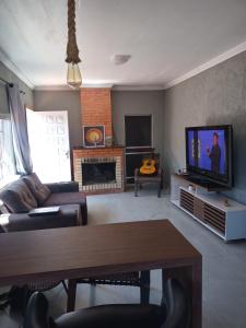 TV/trung tâm giải trí tại Lar doce lar