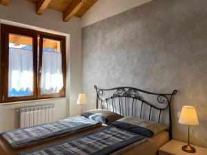 Postel nebo postele na pokoji v ubytování Villa Carlotta