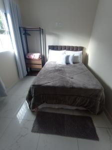 Postel nebo postele na pokoji v ubytování Cantinho na serra + 46 fotografií