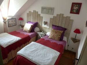 Postel nebo postele na pokoji v ubytování Moulin de la Beraudaie