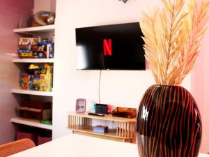 Et tv og/eller underholdning på Maison Billard, Netflix et jeux par Ivona Vacances