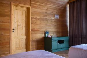 Voodi või voodid majutusasutuse All Seasons Sevan toas