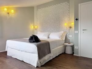 Postel nebo postele na pokoji v ubytování B&B Carmen Garden