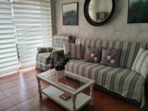 Гостиная зона в Vivienda Vacacional La Candelaria II