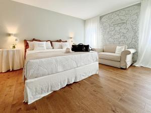 Postel nebo postele na pokoji v ubytování B&B Carmen Garden