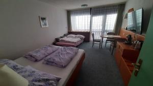 Postel nebo postele na pokoji v ubytování Apartmán Almberg - Mitterdorf - Mitterfirmiansrout