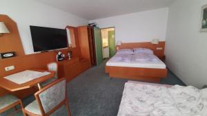 Postel nebo postele na pokoji v ubytování Apartmán Almberg - Mitterdorf - Mitterfirmiansrout