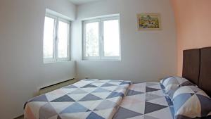 Krevet ili kreveti u jedinici u okviru objekta Apartments Bramar