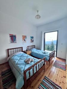Postel nebo postele na pokoji v ubytování Casa de PavL-2