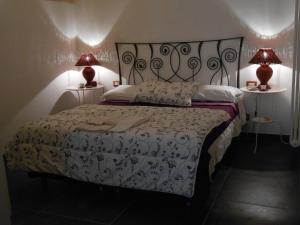 Postel nebo postele na pokoji v ubytování Matera's B&B