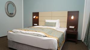 Ένα ή περισσότερα κρεβάτια σε δωμάτιο στο Hotel Class