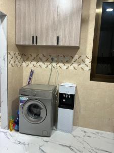 Кухня или мини-кухня в Ekendy Homes
