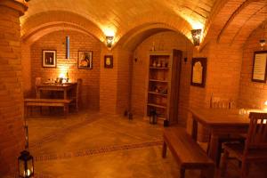 a large room with a table and a dining room at Pousada Quinta da Serra in Cunha