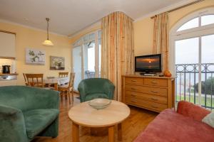 TV a/nebo společenská místnost v ubytování Apartmenthaus Atlantik Apartmenthaus Atlantik 212