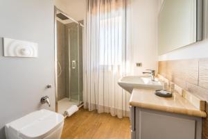 Kúpeľňa v ubytovaní Altea Suites + 33 fotografií