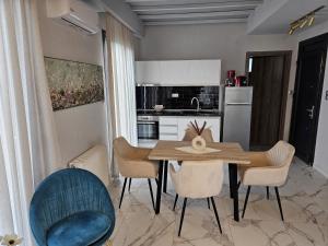 A kitchen or kitchenette at OLYMPUS Paradise 6