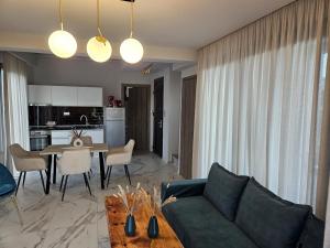 A kitchen or kitchenette at OLYMPUS Paradise 6