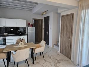 A kitchen or kitchenette at OLYMPUS Paradise 6