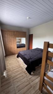 Postel nebo postele na pokoji v ubytování Casa Matinhos 9 + 11 fotografií