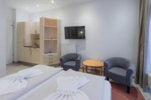 Postel nebo postele na pokoji v ubytování Strandläufer 117 + 11 fotografií