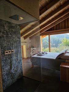 Postel nebo postele na pokoji v ubytování Chalet Noèr