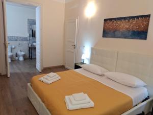 Ένα ή περισσότερα κρεβάτια σε δωμάτιο στο Chrilu house +33 φωτογραφίες