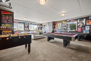 a billiard room with two pool tables in it at Powder Mtn Trapper Lodge TR1 Ski Retreat Game Rm in Eden