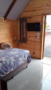 TV a/nebo společenská místnost v ubytování Hotel Pousada e Parada Colonial